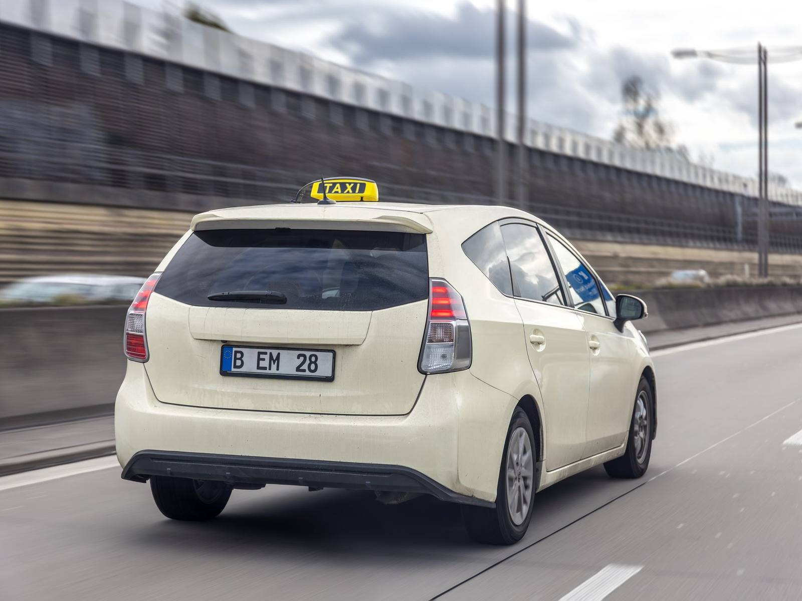 Taxi driving along a highway