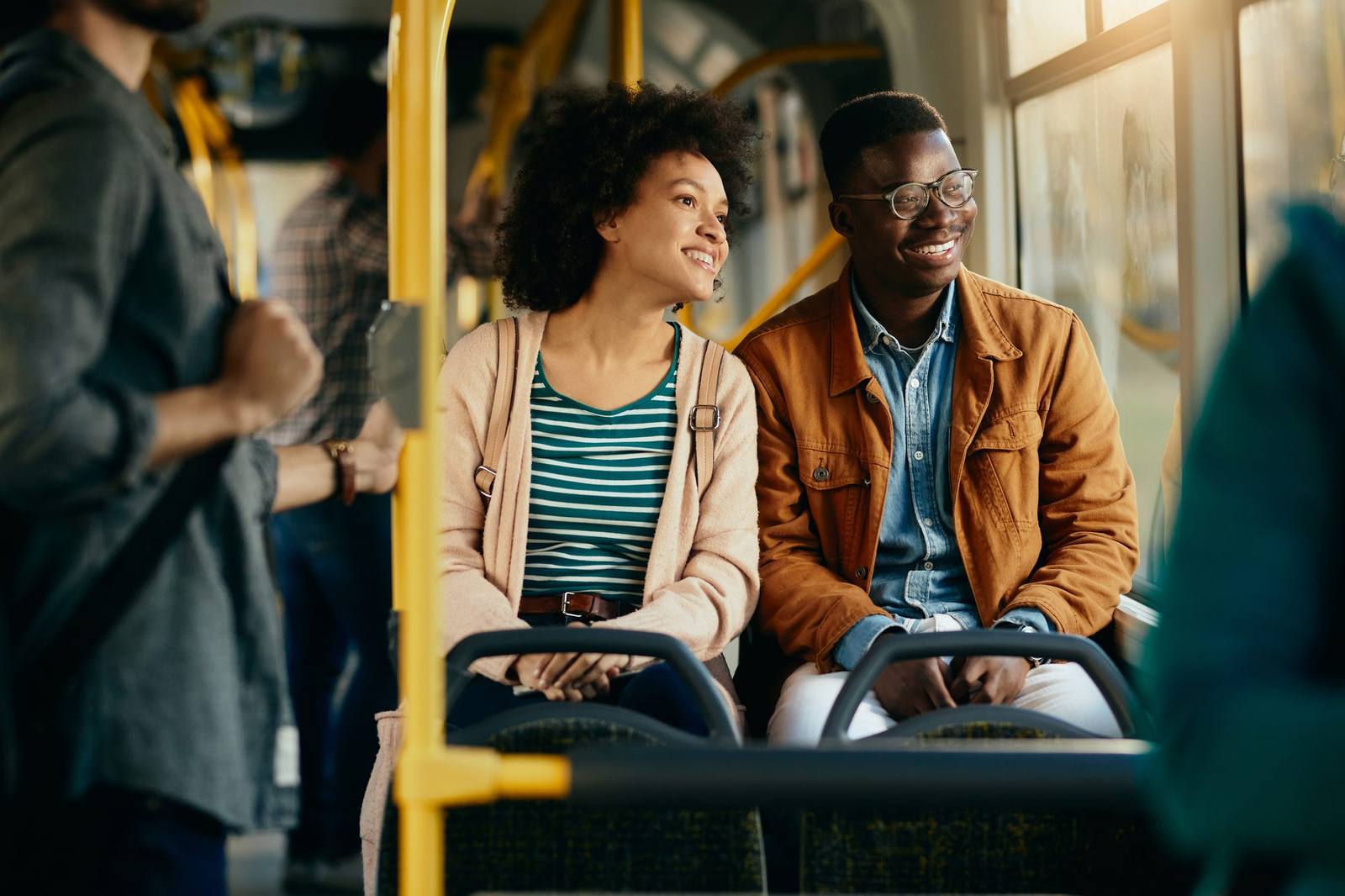 Couple looking out of a bus window