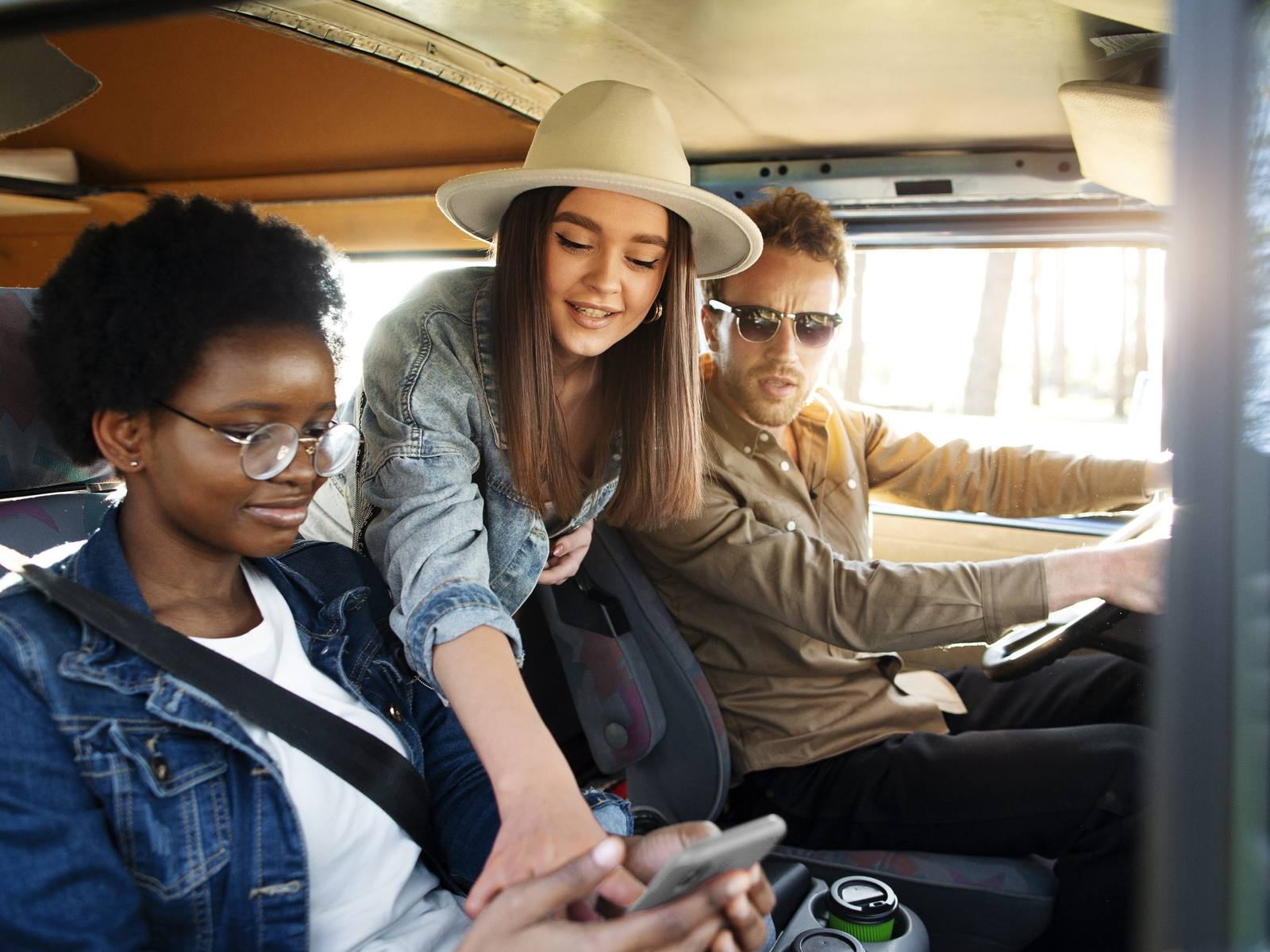 Friends riding together in a van