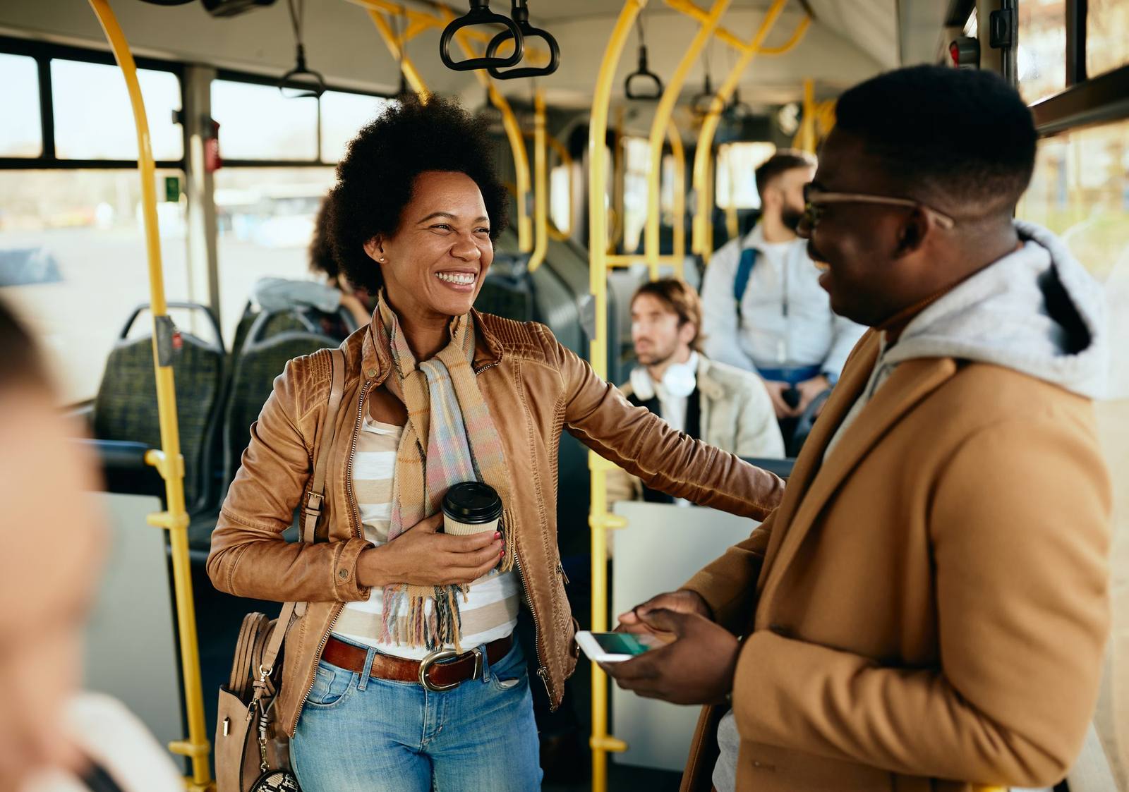Passengers talking on a bus